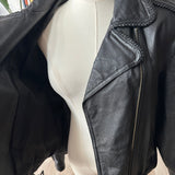 90s Wilson’s leather jacket with feather cutout detail on back.