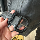 90s Wilson’s leather jacket with feather cutout detail on back.