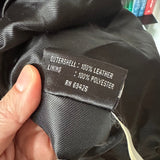 90s Wilson’s leather jacket with feather cutout detail on back.